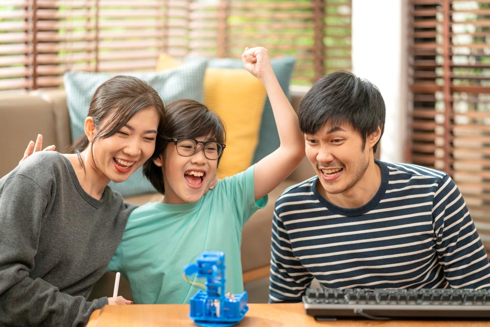 study at home concept,asian boy child with father and mother suc