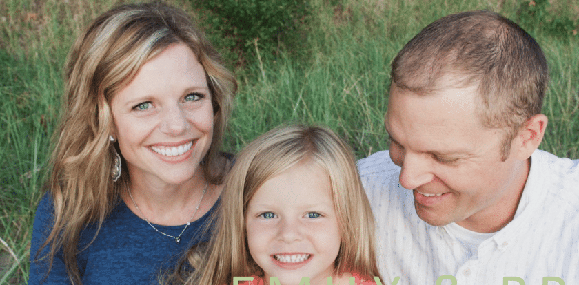 family of three outside